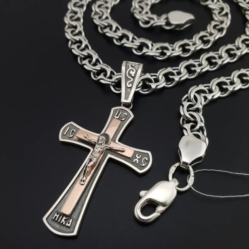 Почему серебряные крестики с золотыми вставками ценятся больше, чем полностью золотые? Срібні хрестики із золотими пластинами з цепочкою